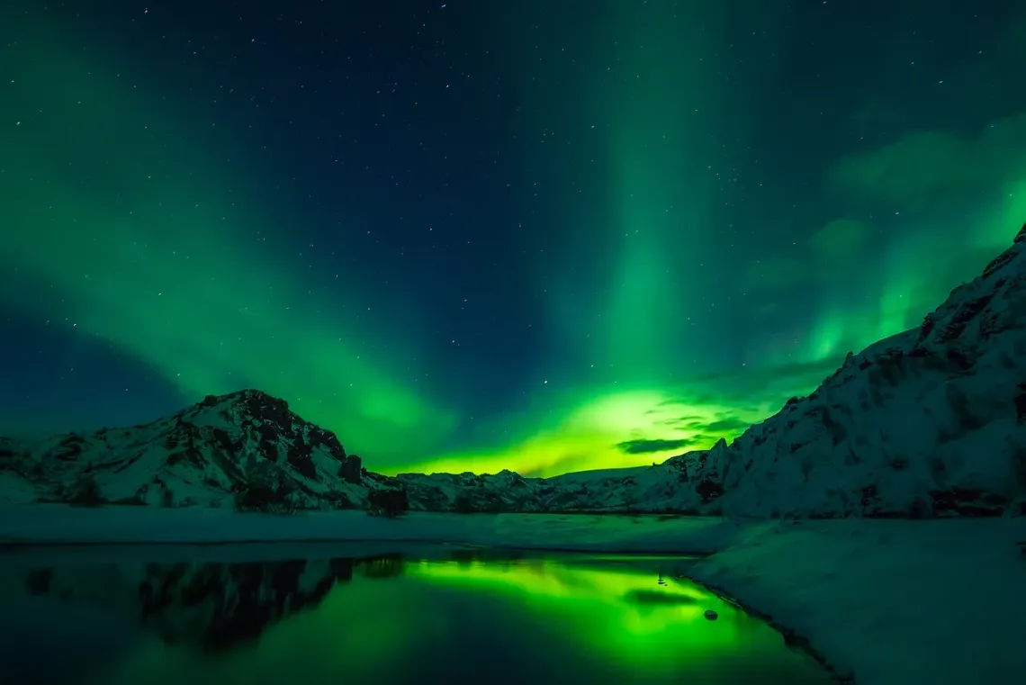 Glacier-and-Volcano-in-the-Northern-Lights-Iceland.webp 